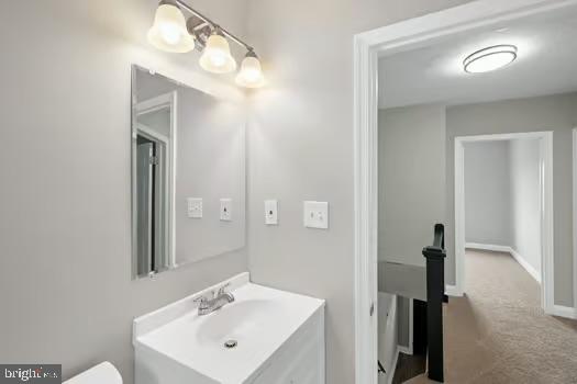 4204 Seidel Avenue Baltimore, MD 21206 - Photo 19 of 23 a bathroom with a sink and a mirror
