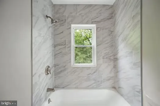 a view of an empty room with stairs