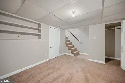 a view of a room with racks on the wall