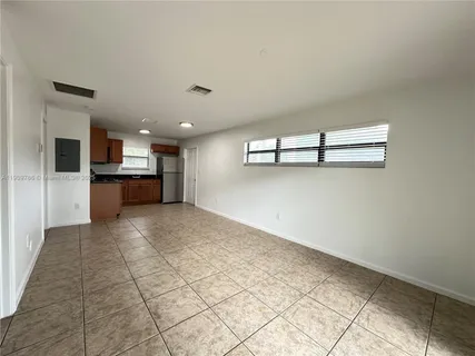 a view of a kitchen with a sink