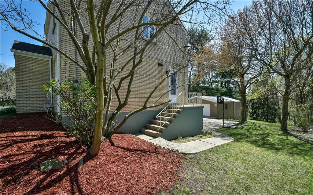 145 Siebert Road Pittsburgh, PA 15237 - Photo 3 of 24 a view of a house with a yard