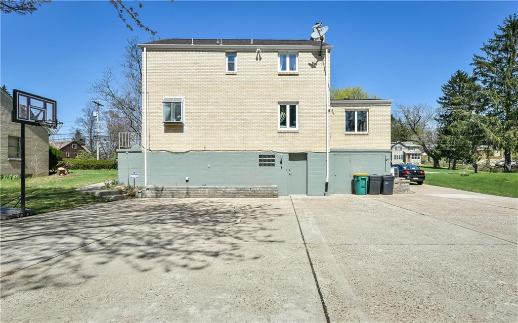145 Siebert Road Pittsburgh, PA 15237 - Photo 4 of 24 a view of a house with a street