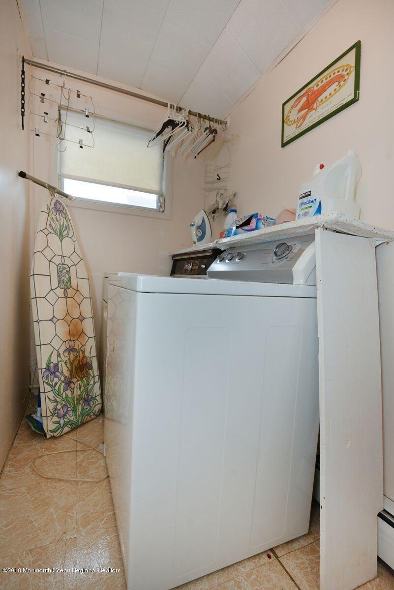 77 Cookman Avenue Ocean Grove, NJ 07756 - Photo 15 of 23 a utility room with dryer and washer
