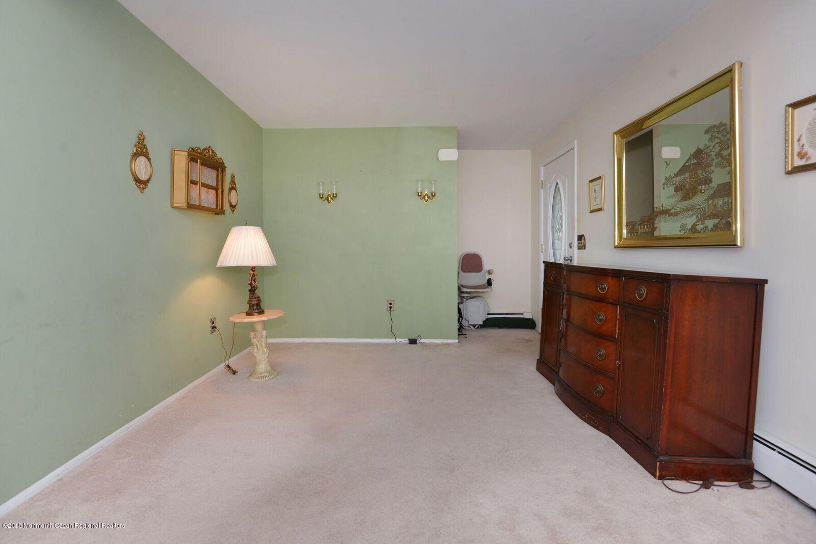 77 Cookman Avenue Ocean Grove, NJ 07756 - Photo 5 of 23 a room with painting and a table