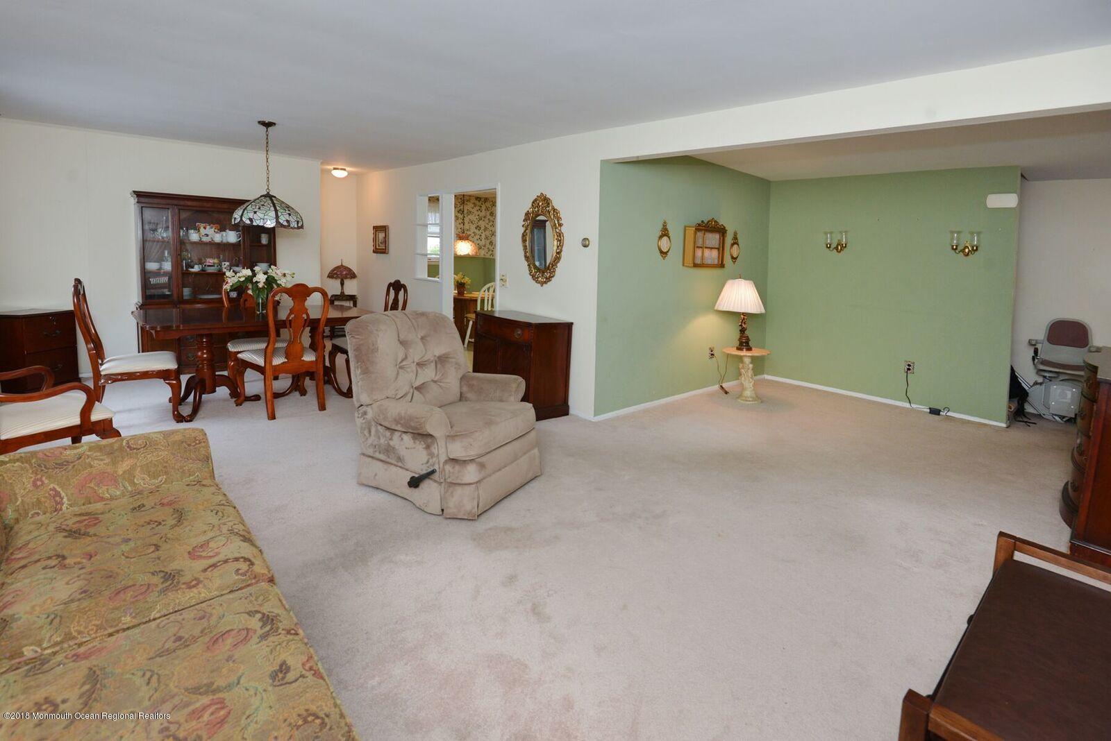 77 Cookman Avenue Ocean Grove, NJ 07756 - Photo 6 of 23 a view of a room with gym equipment