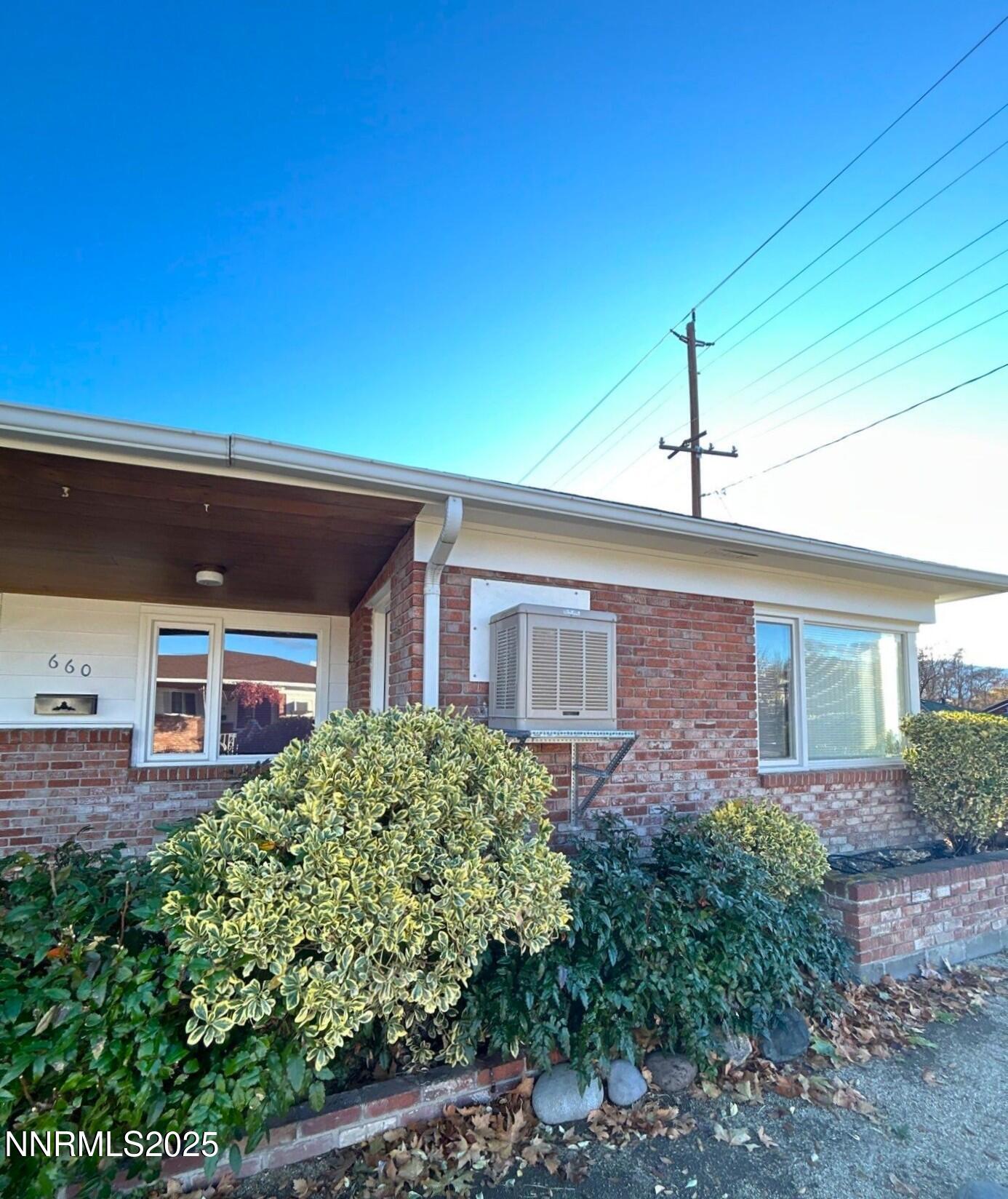 660 Kirman Avenue Reno, NV 89502 - Photo 1 of 17 a front view of a house with garden