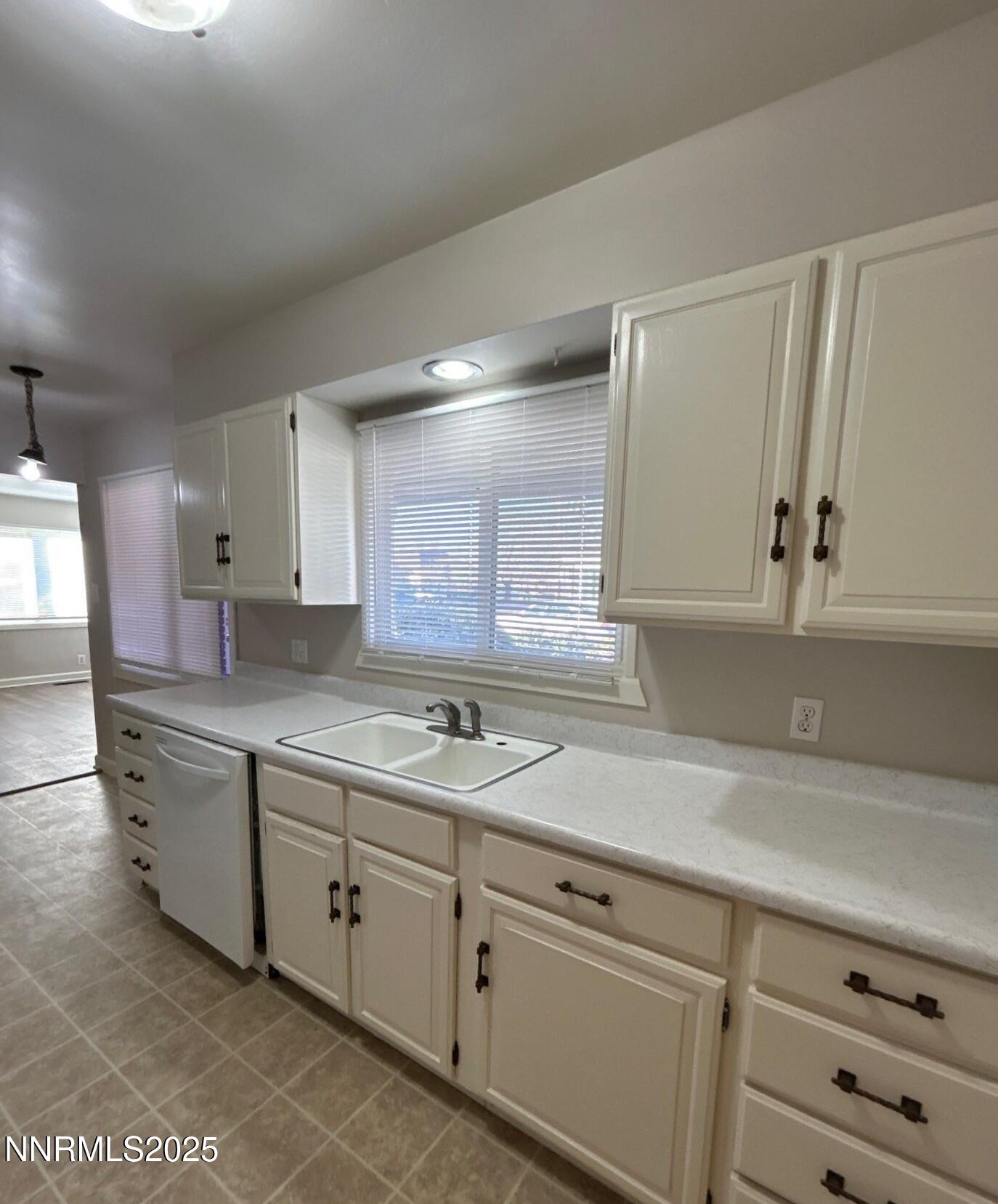 660 Kirman Avenue Reno, NV 89502 - Photo 7 of 17 a kitchen with sink and cabinets