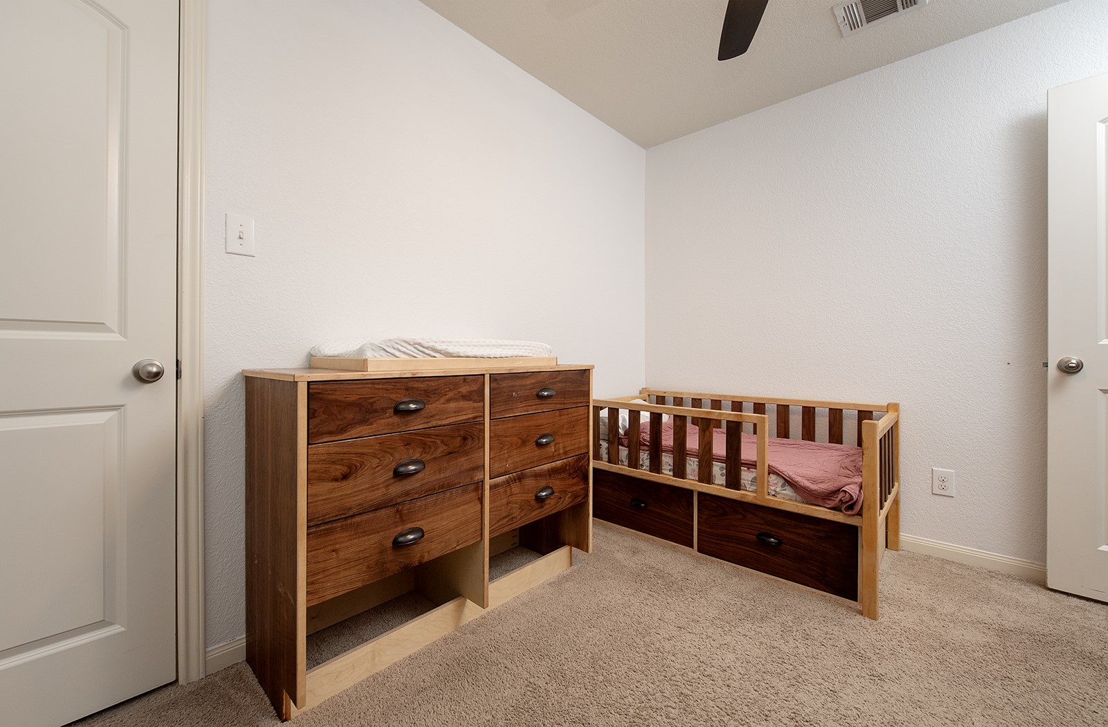 216 Millers Loop Jarrell, TX 76537 - Photo 19 of 31 Bedroom with light colored carpet and a ceiling fan