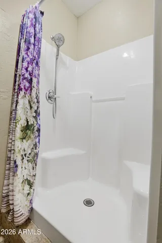 a bathroom with a bath tub