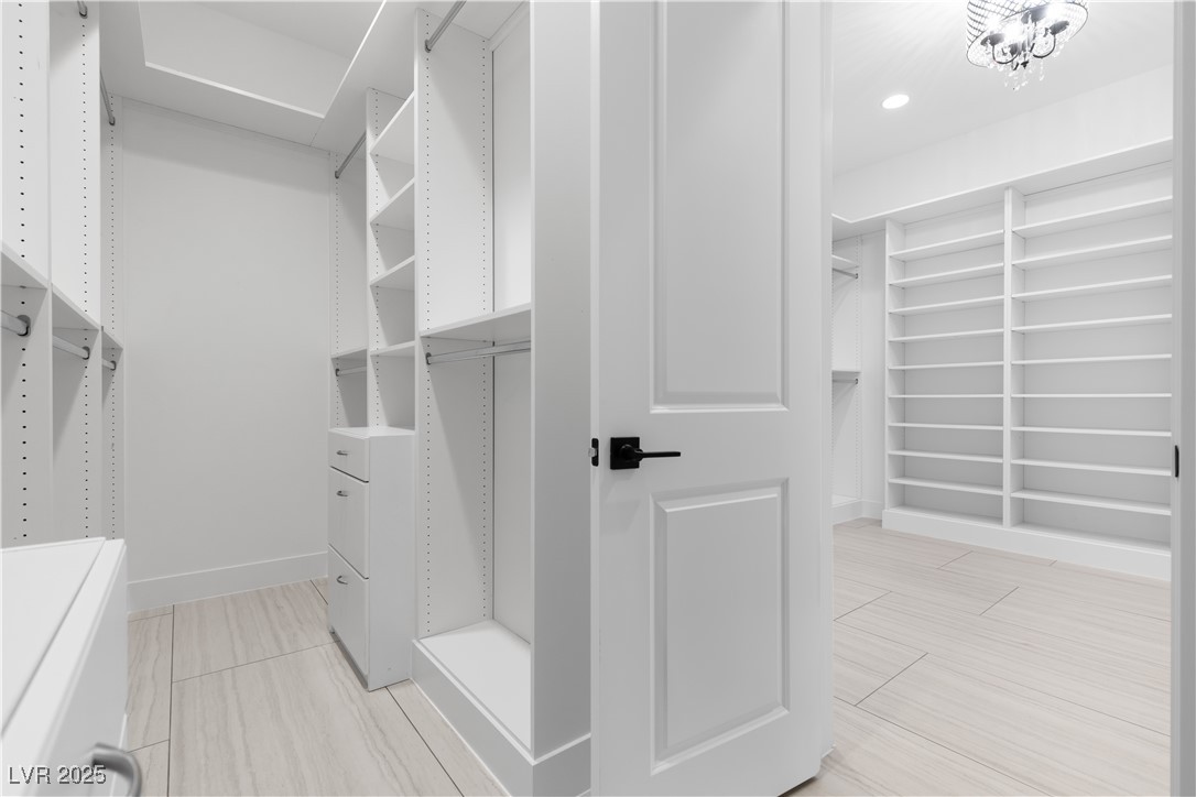 9865 Bright Angel Way Las Vegas, NV 89149 - Photo 55 of 98 Primary Walk In Closet #2, Adjustable Melamine Shelving,