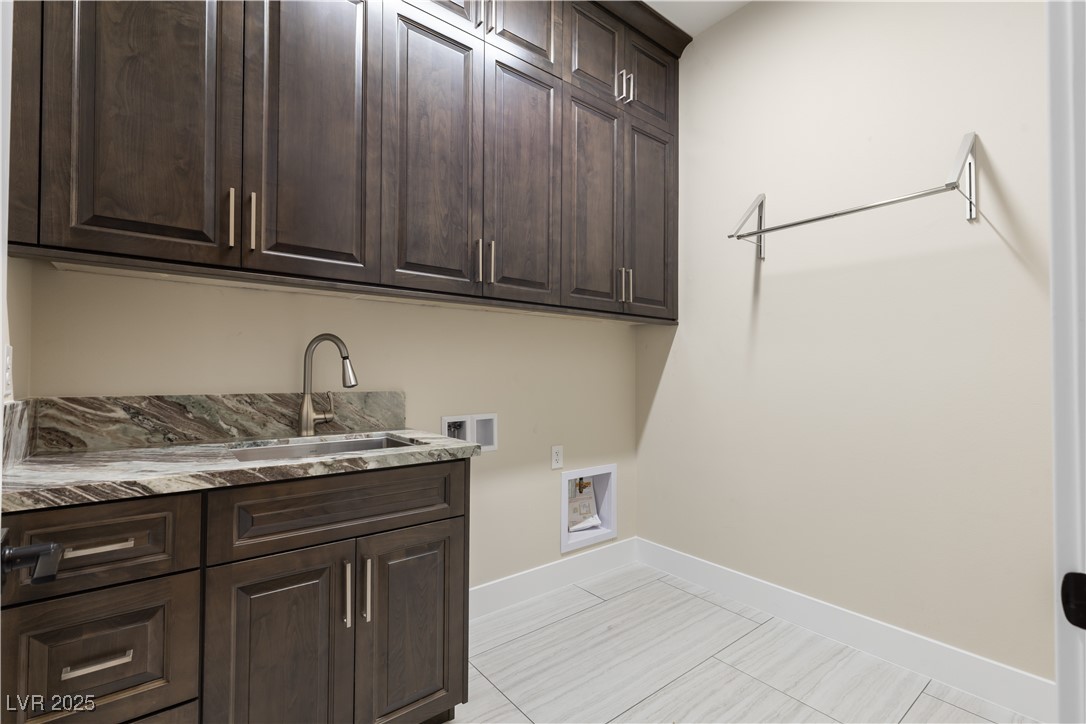 9865 Bright Angel Way Las Vegas, NV 89149 - Photo 57 of 98 Quartzite Top, Stainless Steel Sink, Ceiling Height Upper Cabinets