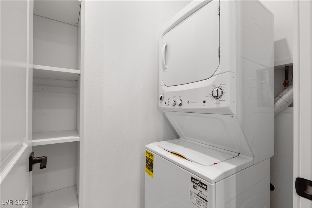 9865 Bright Angel Way Las Vegas, NV 89149 - Photo 69 of 98 Casita 1 Laundry room featuring stacked washer / dryer