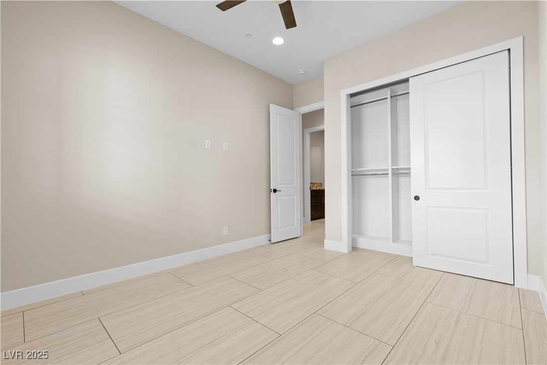 9865 Bright Angel Way Las Vegas, NV 89149 - Photo 72 of 98 Casita 1 bedroom 4 featuring a closet, baseboards, a ceiling fan, and light wood finished floors