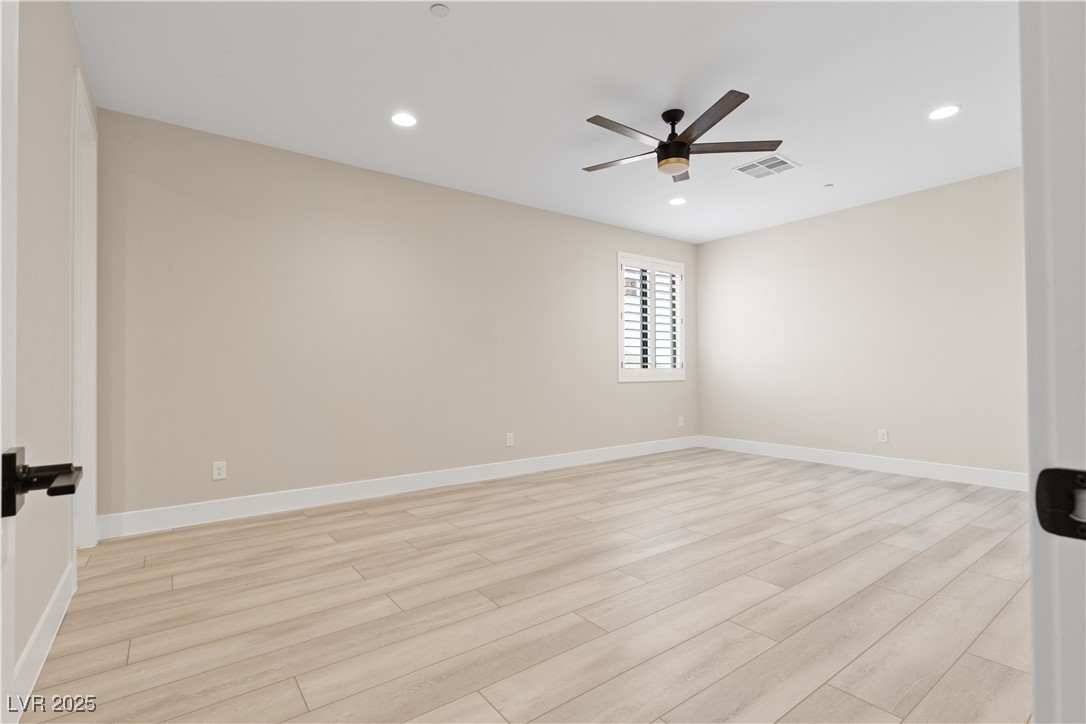 9865 Bright Angel Way Las Vegas, NV 89149 - Photo 82 of 98 Casita #2 Bedroom 7 with a ceiling fan, light wood-type flooring, recessed lighting, and baseboards