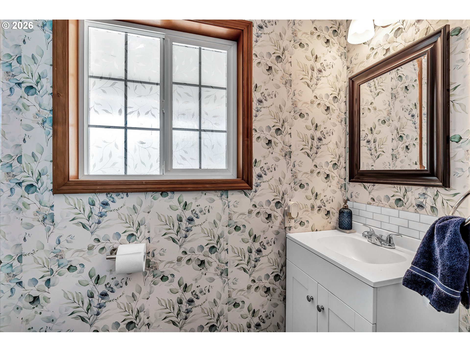 12313 South Groshong Road Molalla, OR 97038 - Photo 17 of 48 a bathroom with a sink and a mirror