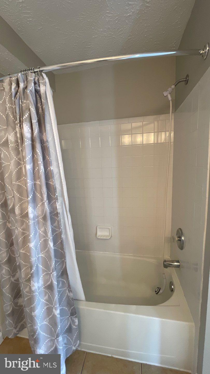 4915 Riders Court, Unit 4915 Owings Mills, MD 21117 - Photo 19 of 25 a bathroom with a shower