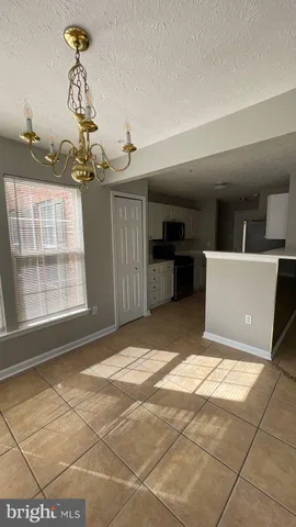 a view of a livingroom with a furniture