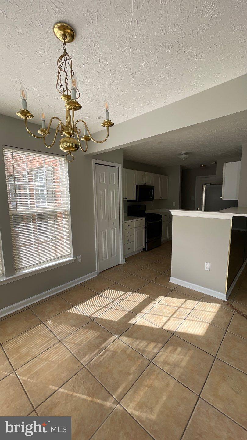 4915 Riders Court, Unit 4915 Owings Mills, MD 21117 - Photo 9 of 25 a view of a livingroom with a furniture