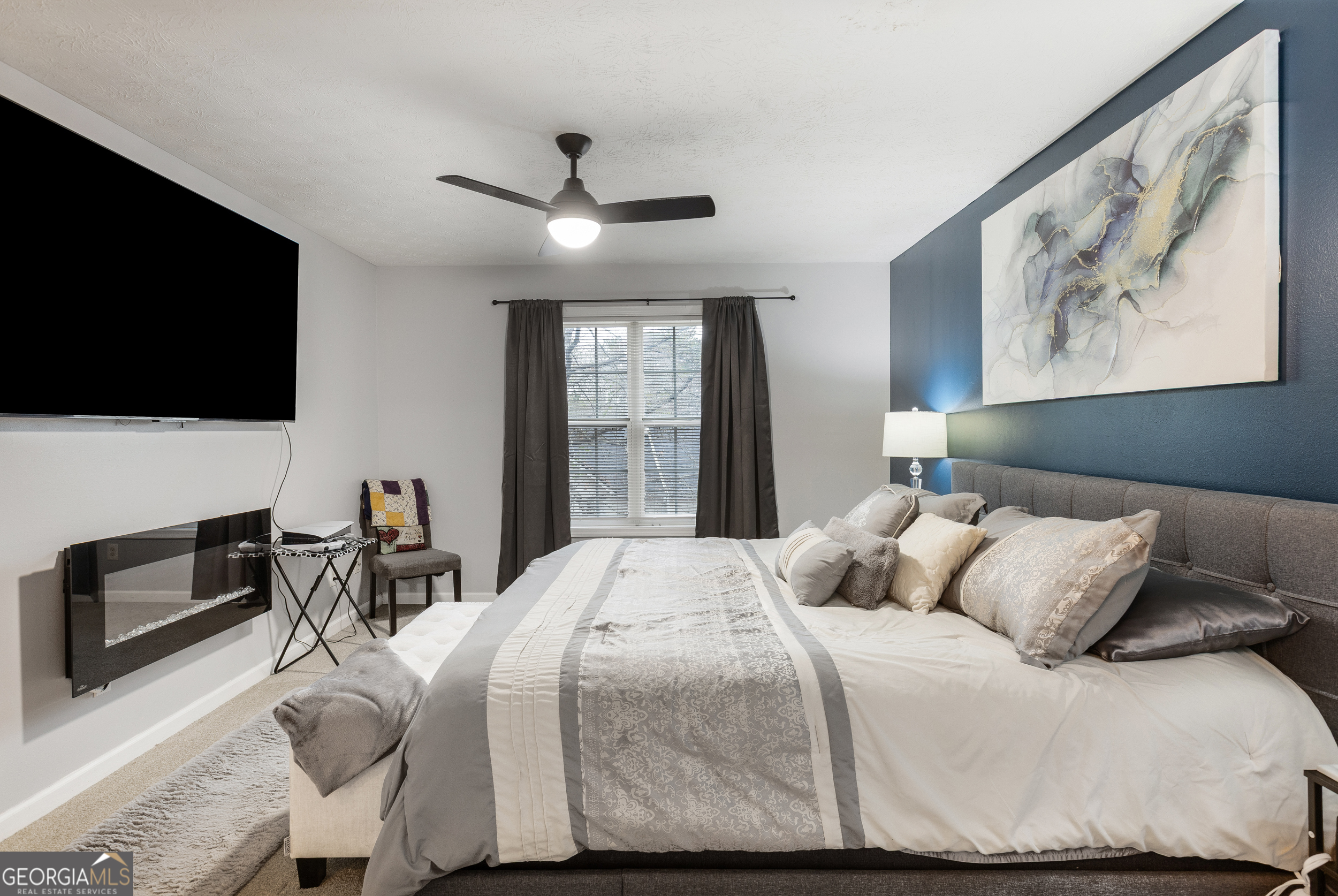 159 Villa Rosa Ridge Temple, GA 30179 - Photo 14 of 31 a bedroom with a bed and a flat screen tv