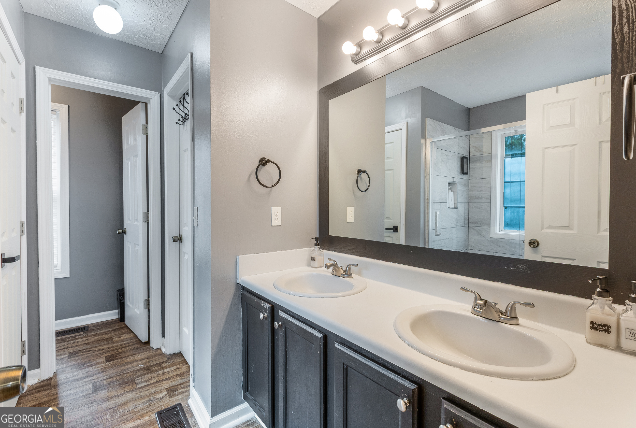 159 Villa Rosa Ridge Temple, GA 30179 - Photo 15 of 31 a bathroom with a sink double vanity and a mirror