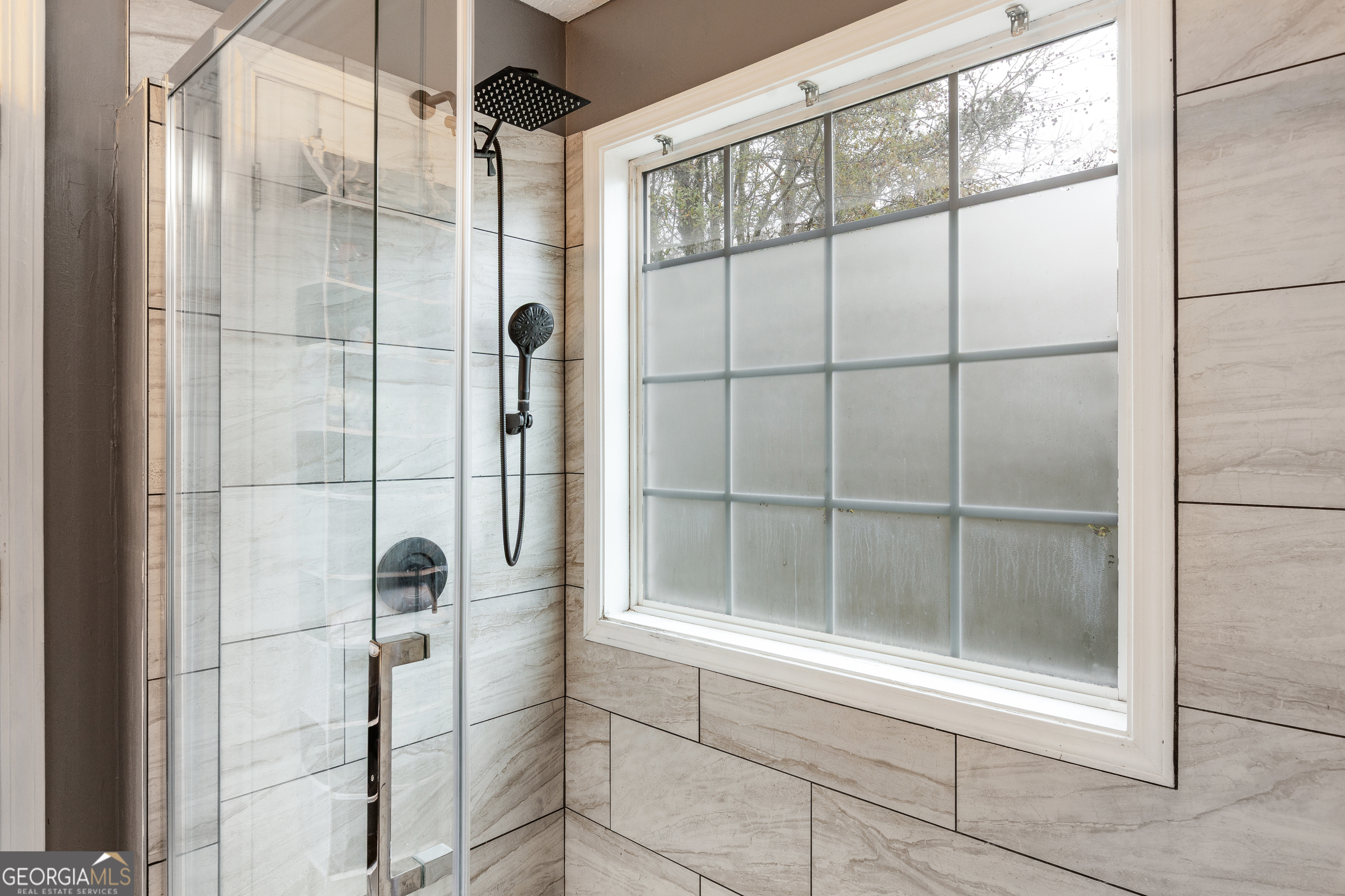 159 Villa Rosa Ridge Temple, GA 30179 - Photo 17 of 31 a bathroom with a glass shower door