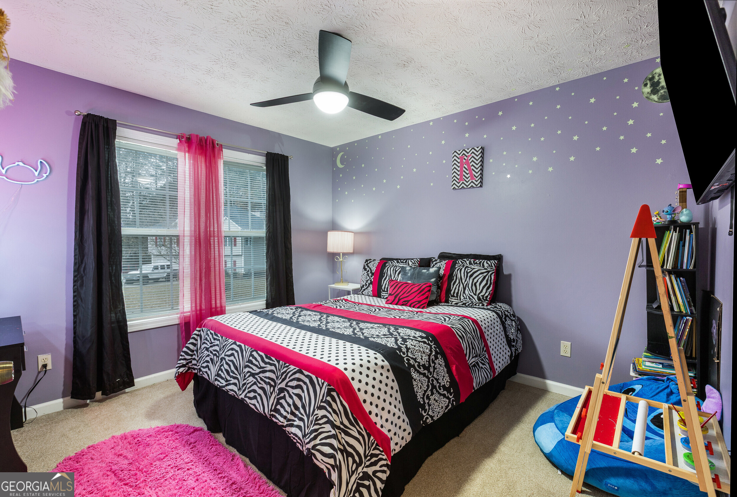 159 Villa Rosa Ridge Temple, GA 30179 - Photo 18 of 31 a bed room with a bed and a book shelf