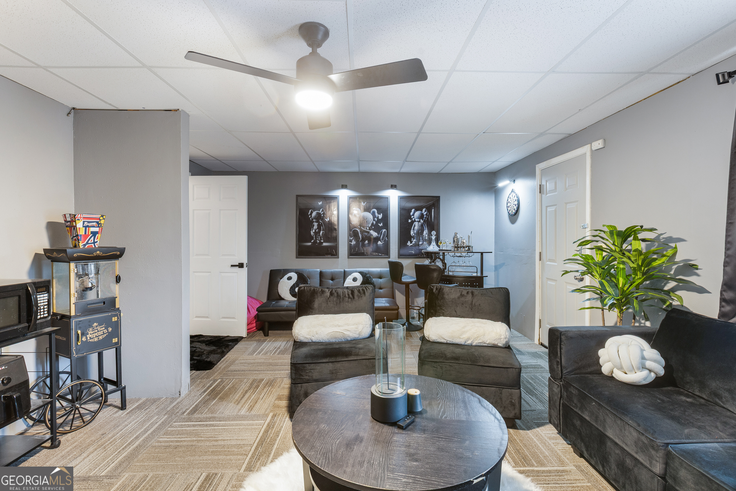 159 Villa Rosa Ridge Temple, GA 30179 - Photo 23 of 31 a living room with furniture and a chandelier
