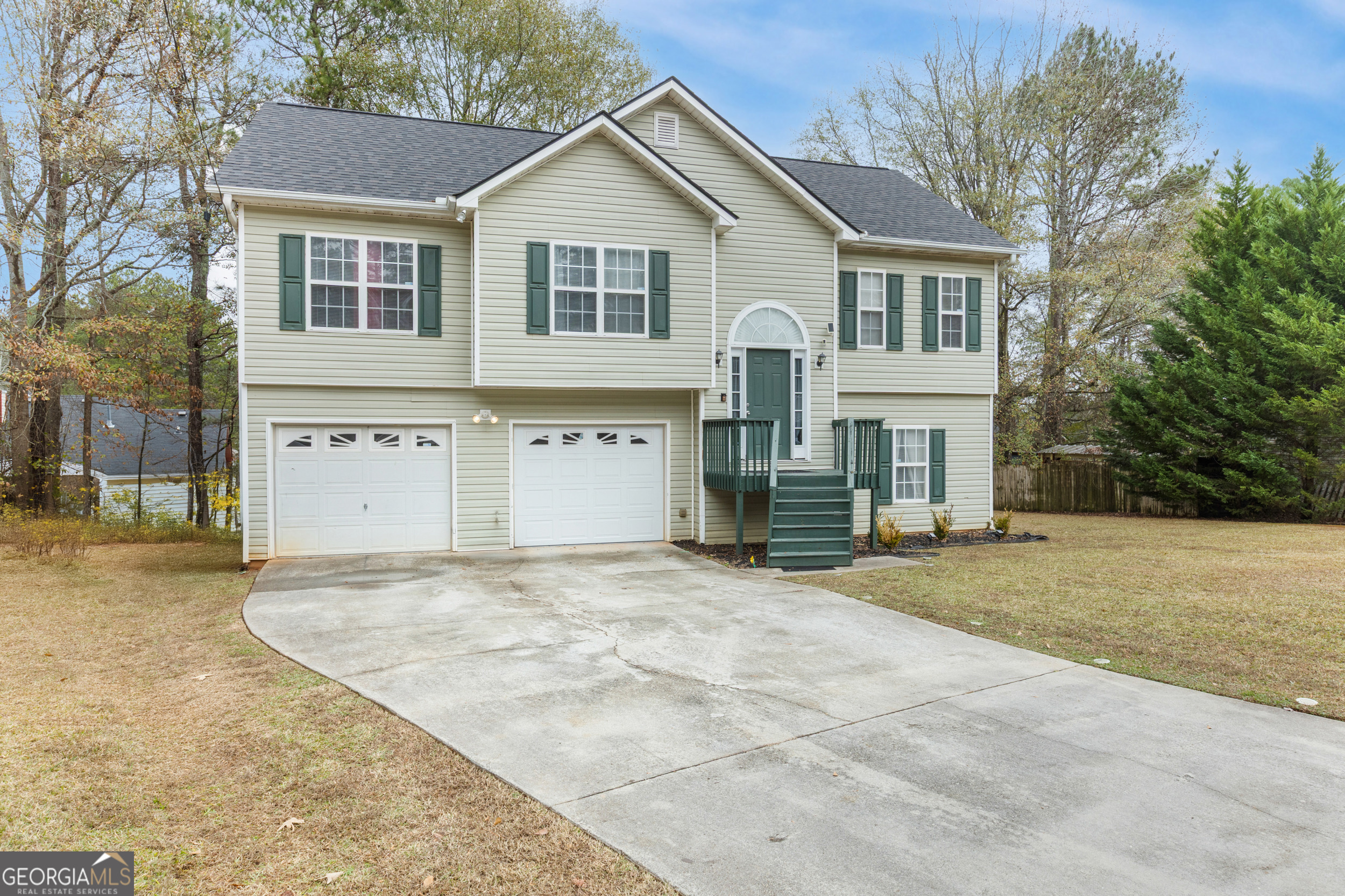 159 Villa Rosa Ridge Temple, GA 30179 - Photo 29 of 31 a front view of a house with a yard and garage