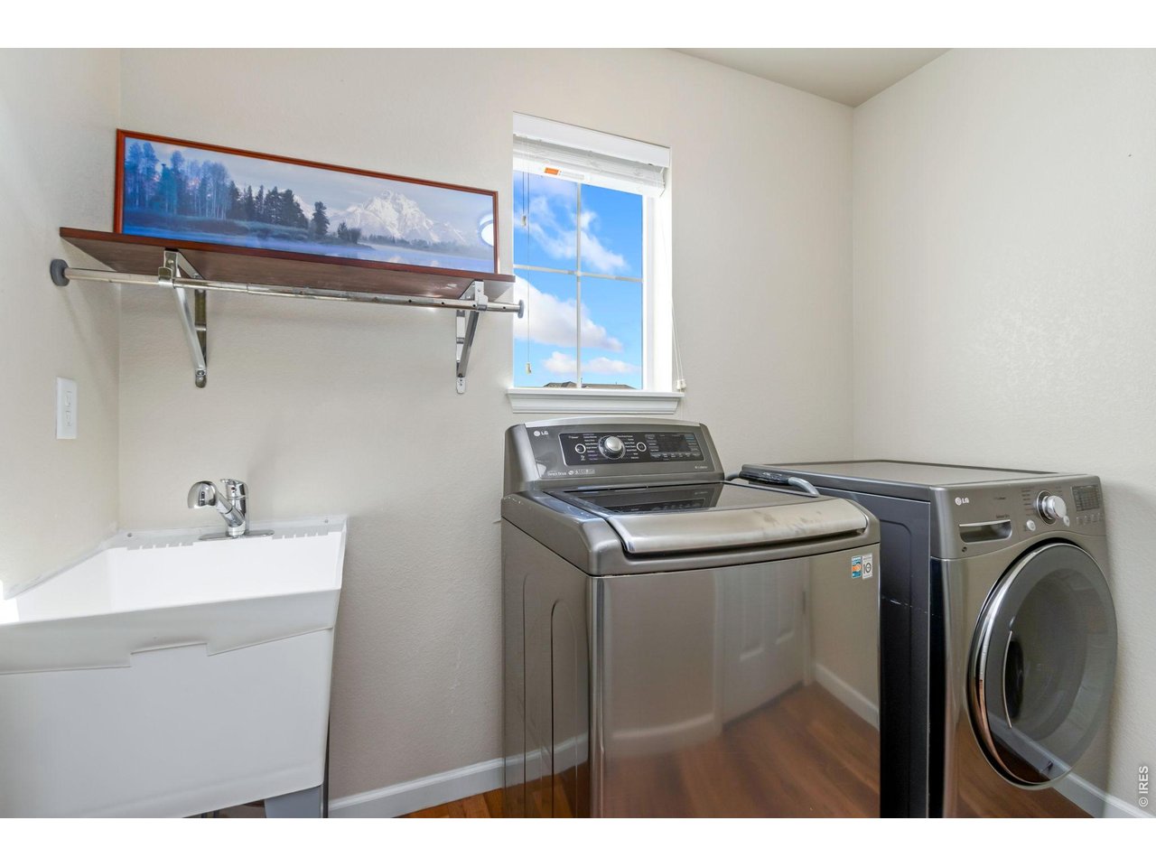 6772 Rainier Road Timnath, CO 80547 - Photo 25 of 43 Upper floor laundry w/sink