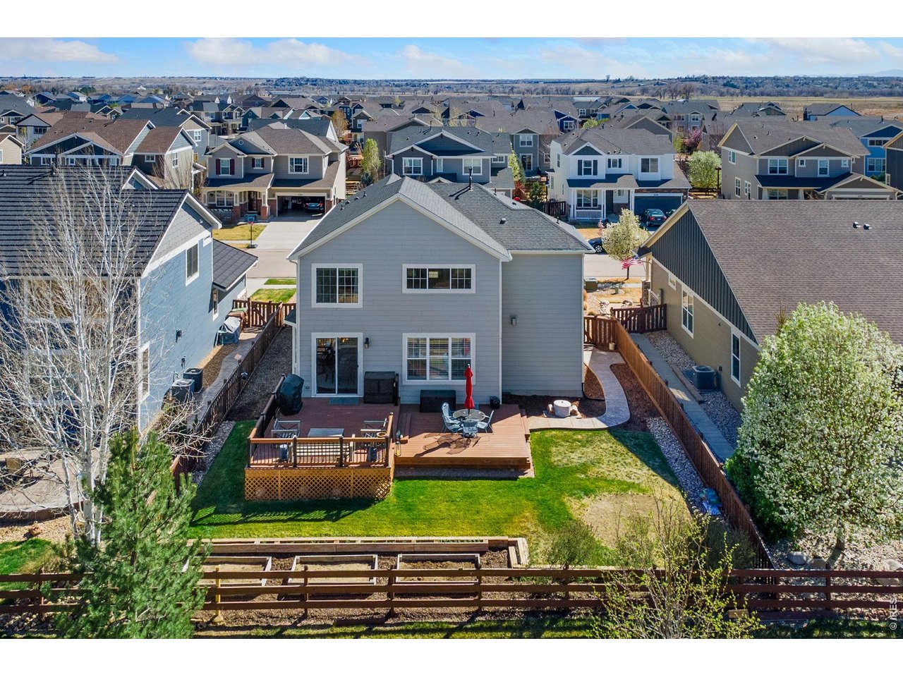6772 Rainier Road Timnath, CO 80547 - Photo 26 of 43 Spacious Custom Deck & Garden Beds