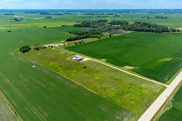 a view of a field with grassy field