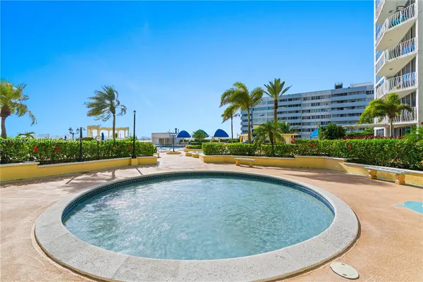 a view of outdoor space yard swimming pool and outdoor kitchen