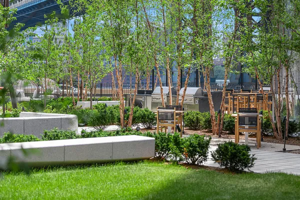 a view of a swimming pool with an outdoor seating and a window