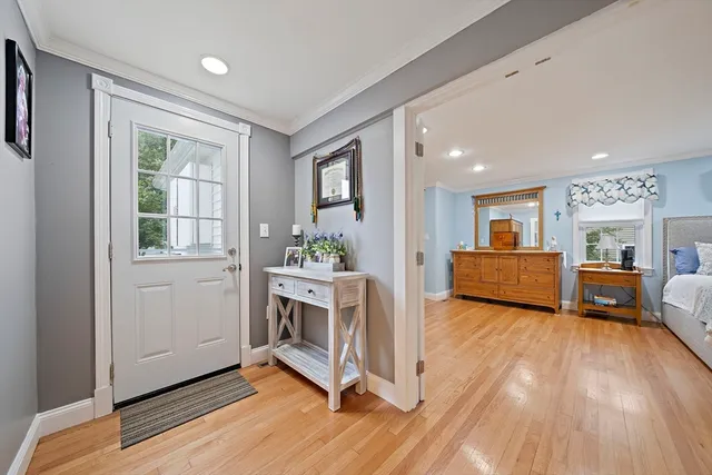 a view of a livingroom with furniture and a kitchen