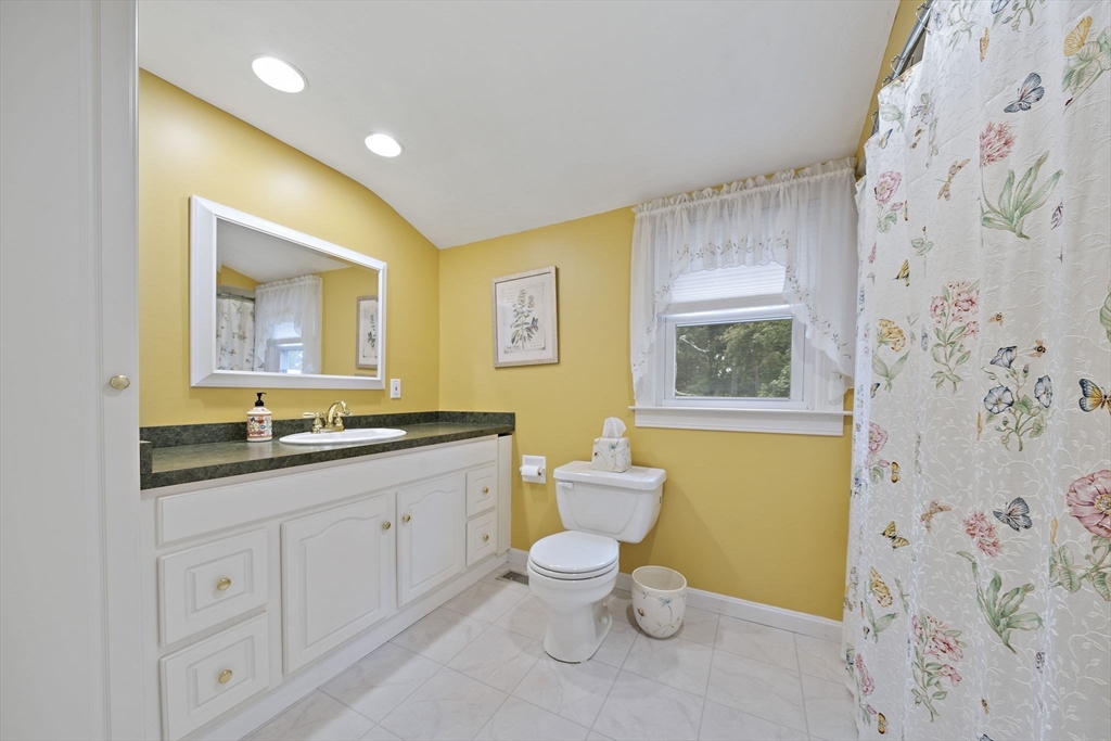 16 Jay Road Weymouth, MA 02190 - Photo 26 of 40 a bathroom with a toilet sink and mirror