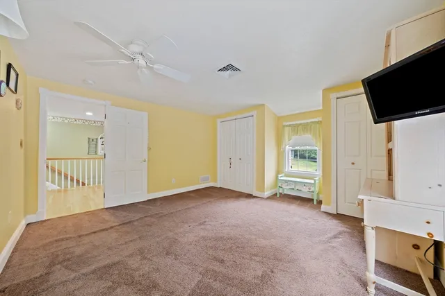 a view of a livingroom with an empty room