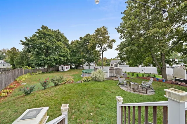 a view of a house with a yard porch and sitting area