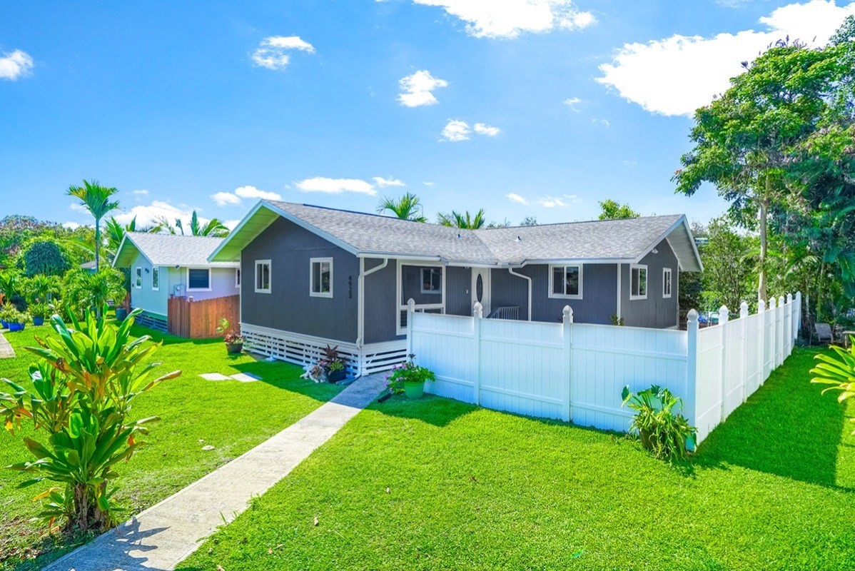 4923 Aliali Road, Unit 14 Kapaa, HI 96746 - Photo 2 of 30 a front view of a house with a garden
