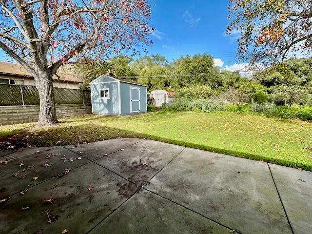 a house with trees in the background