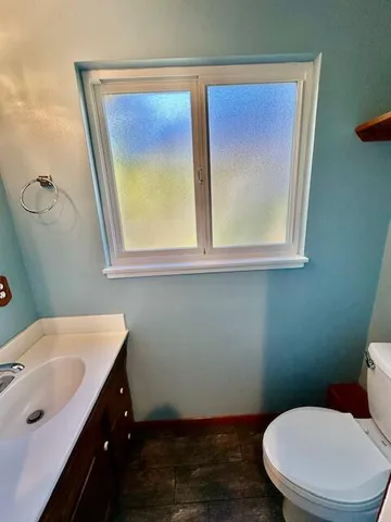 a bathroom with a sink and a toilet