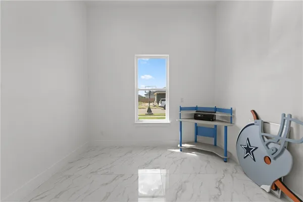 a view of workspace with lounge chair