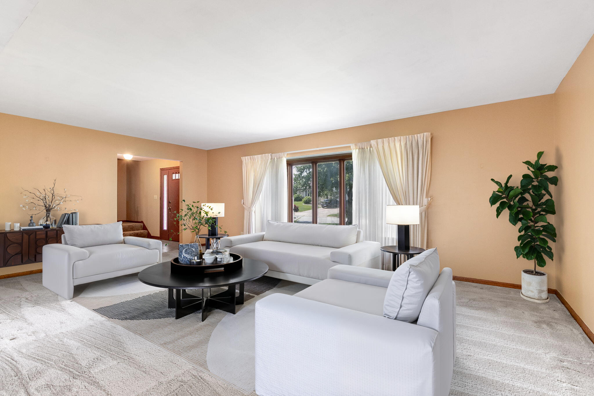 1121 Cheyenne Drive Crown Point, IN 46307 - Photo 4 of 18 a living room with furniture and a large window