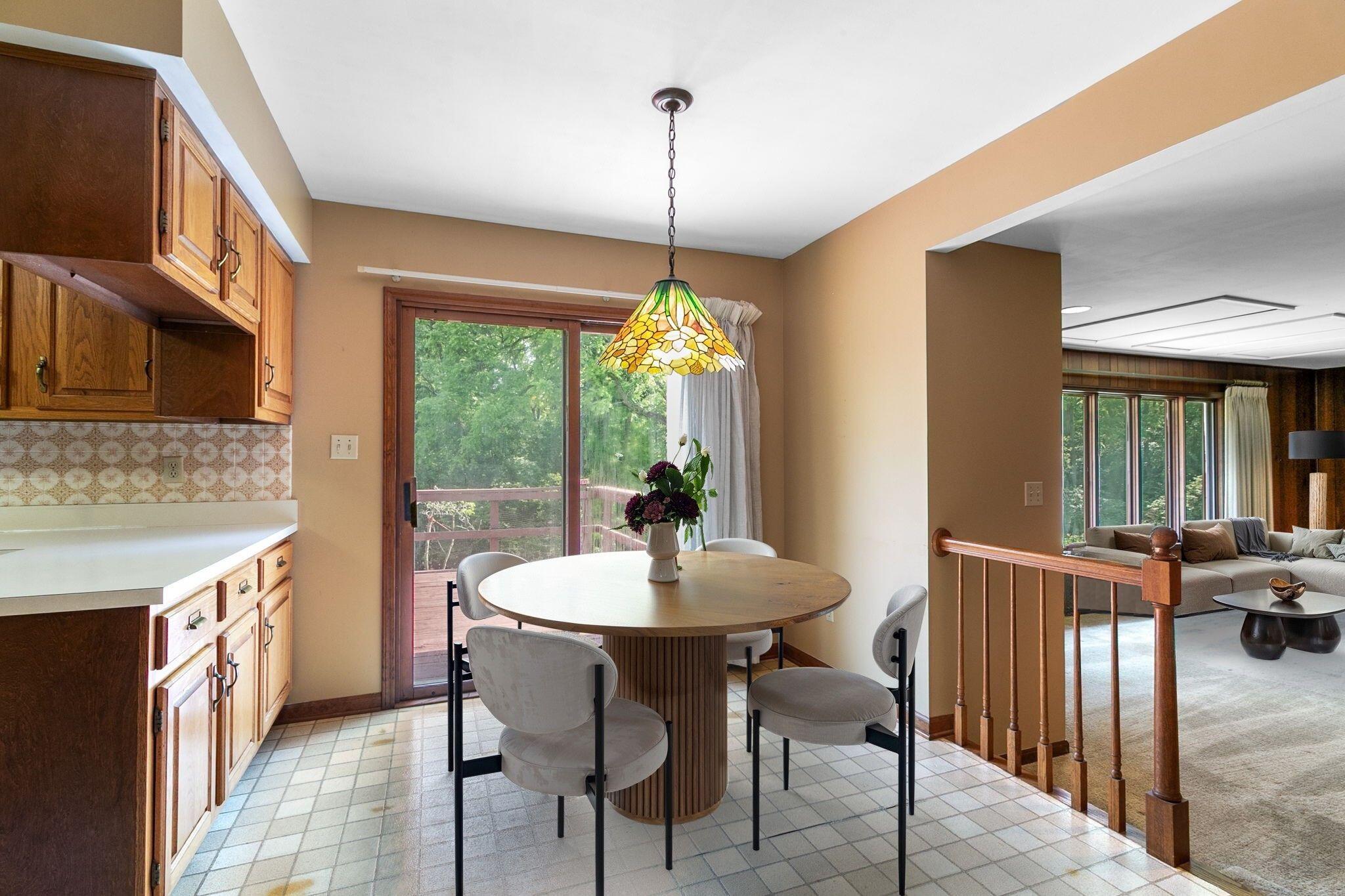 1121 Cheyenne Drive Crown Point, IN 46307 - Photo 8 of 18 a dining room with furniture window wooden floor