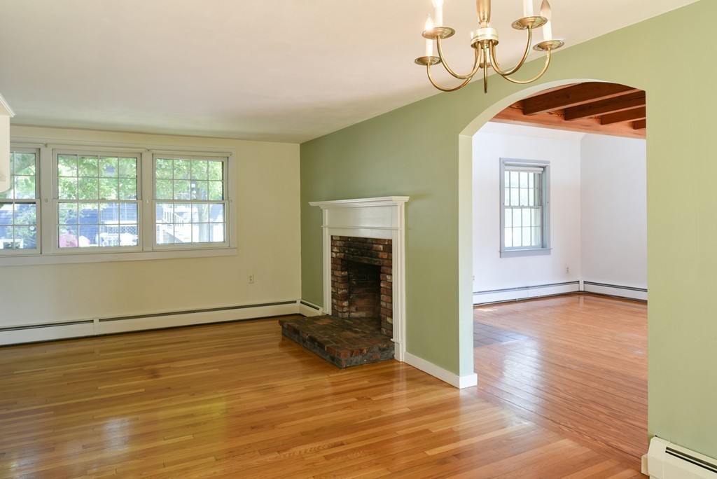 2 Knollwood Road Marblehead, MA 01945 - Photo 9 of 30 an empty room with wooden floor and windows