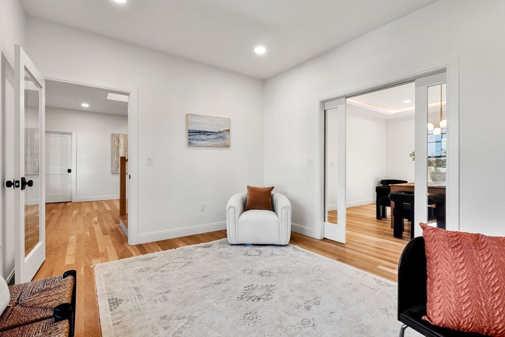 59 Dexter Road Melrose, MA 02176 - Photo 23 of 41 a bedroom with furniture and mirror