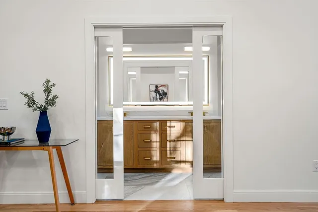 a bathroom with a bathtub and a sink