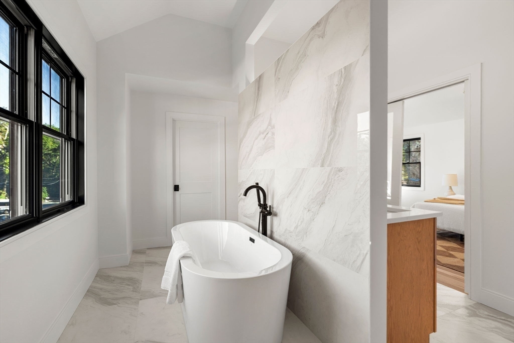 59 Dexter Road Melrose, MA 02176 - Photo 31 of 41 a bathroom with a sink and mirror