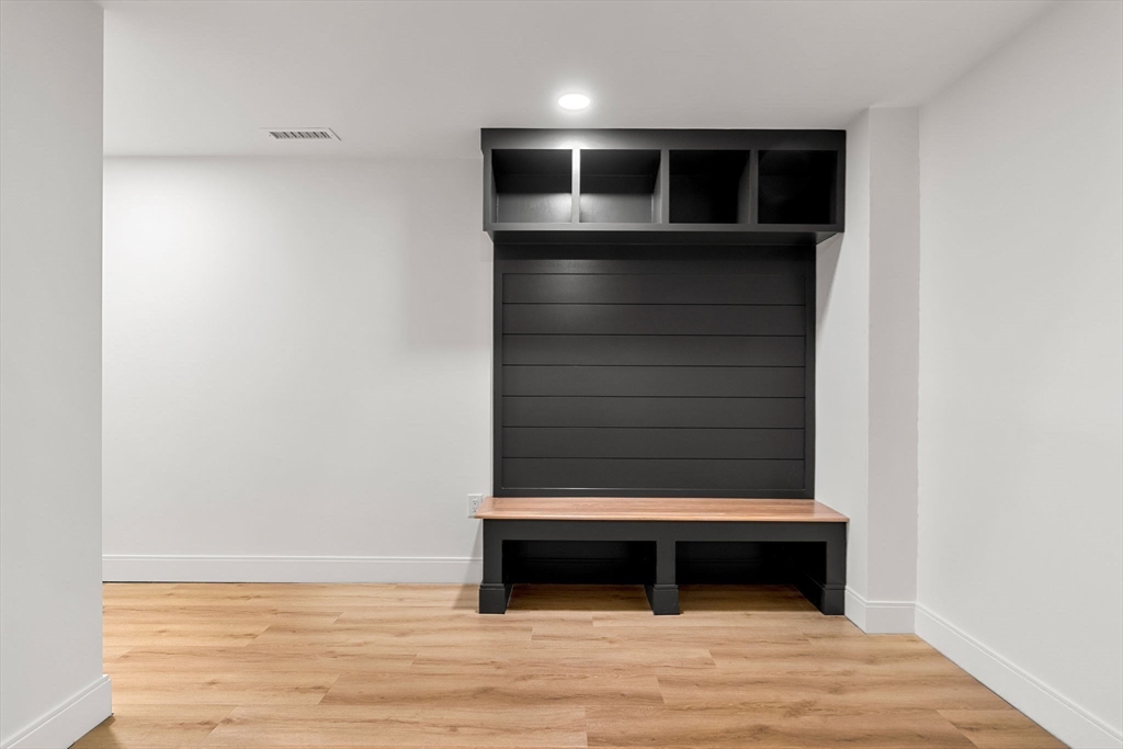 59 Dexter Road Melrose, MA 02176 - Photo 34 of 41 a view of room with wooden floor