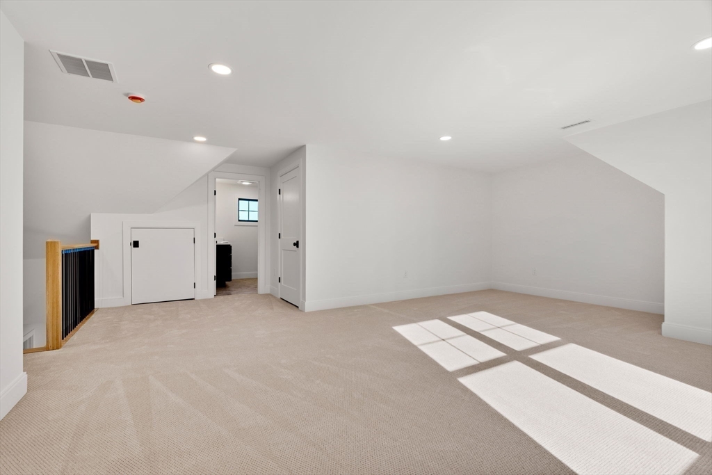 59 Dexter Road Melrose, MA 02176 - Photo 36 of 41 an empty room with windows