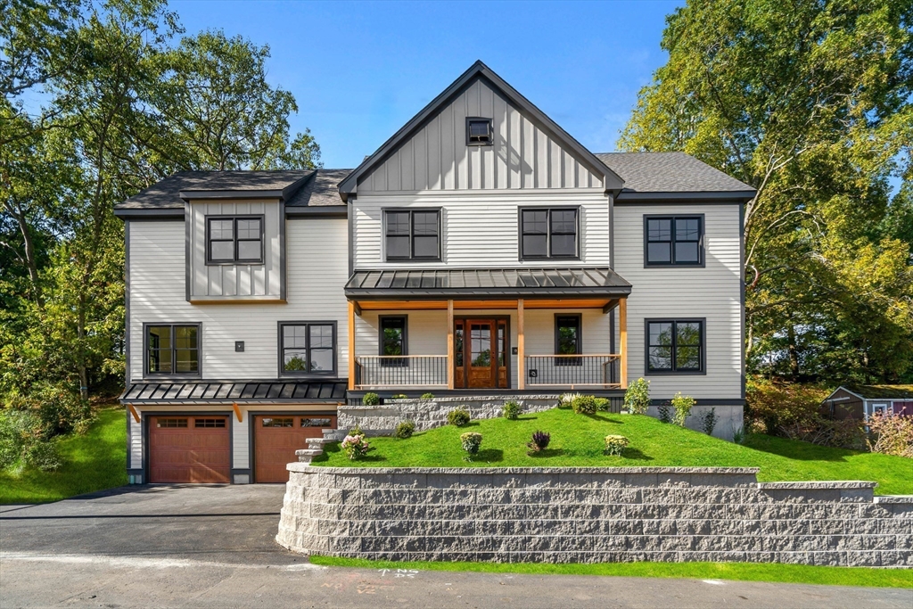 59 Dexter Road Melrose, MA 02176 - Photo 4 of 41 a front view of a house with a garden